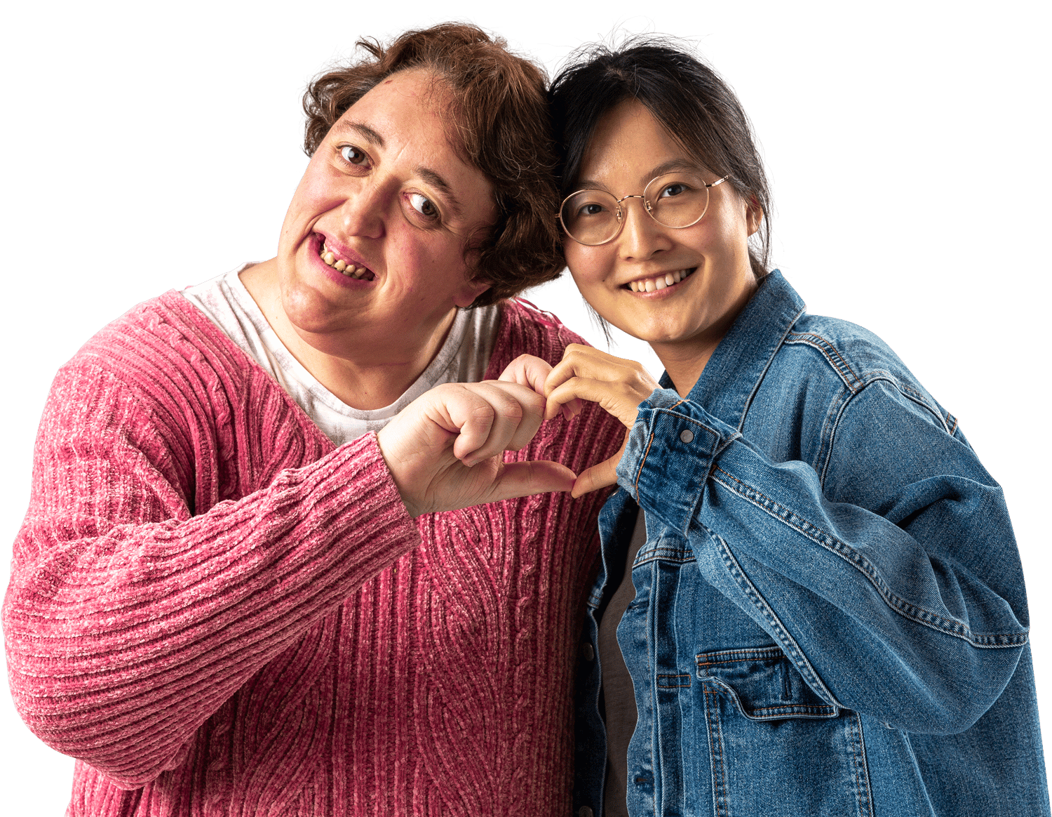 Two together² participants smiling and forming a heart shape with their hands
